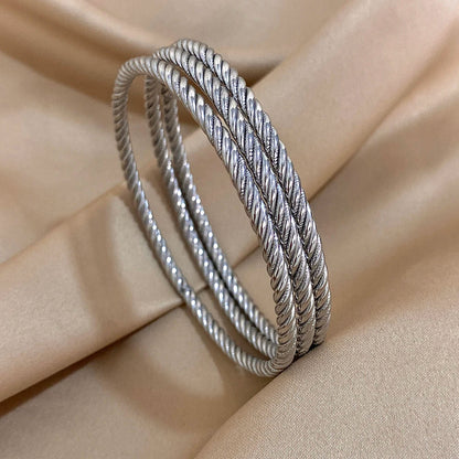 Maud | Elegant Twist Bangle