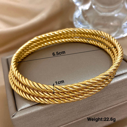 Maud | Elegant Twist Bangle
