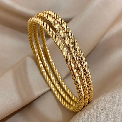 Maud | Elegant Twist Bangle